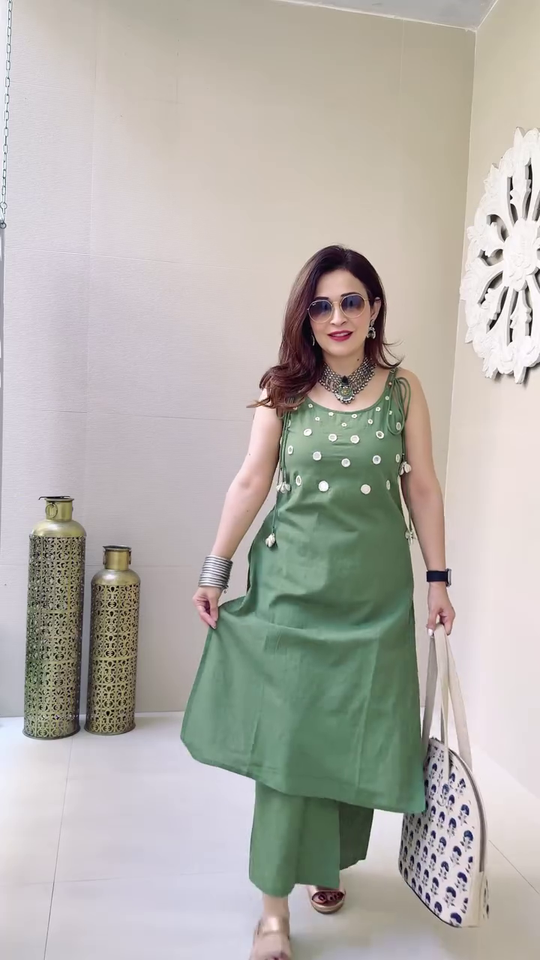 Elegant Sleeveless Mirror Work Kurta Set in Rust