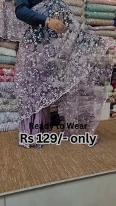 Elegant Purple Net Saree with Intricate Design