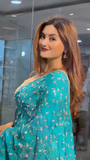 Elegant Turquoise Sari Adorned with Delicate Silver Embroidery